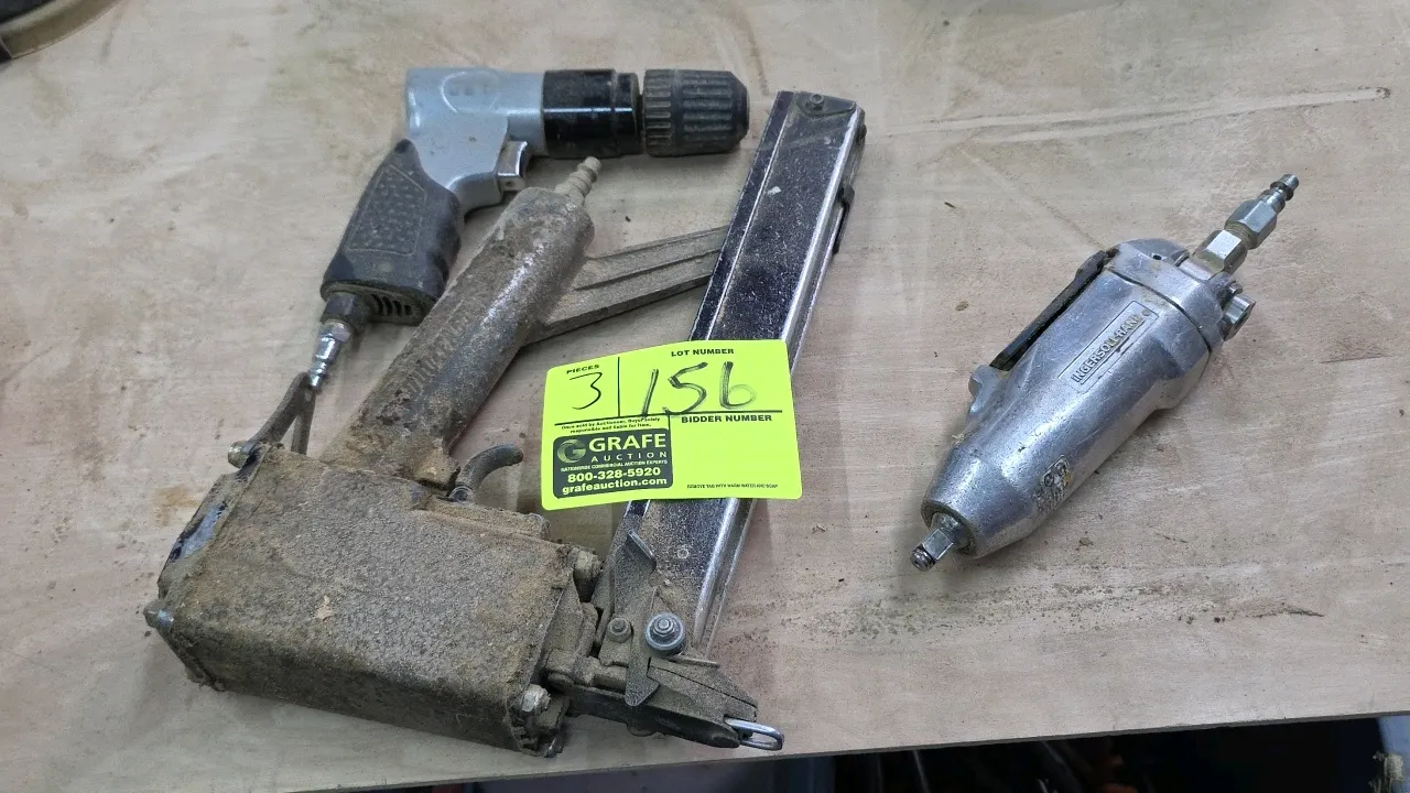 Pneumatic air tool lot. Includes Duo-Fast pneumatic stapler, Ingersoll Rand 216 inline pneumatic impact wrench, and Jet reversible air drill with keyl