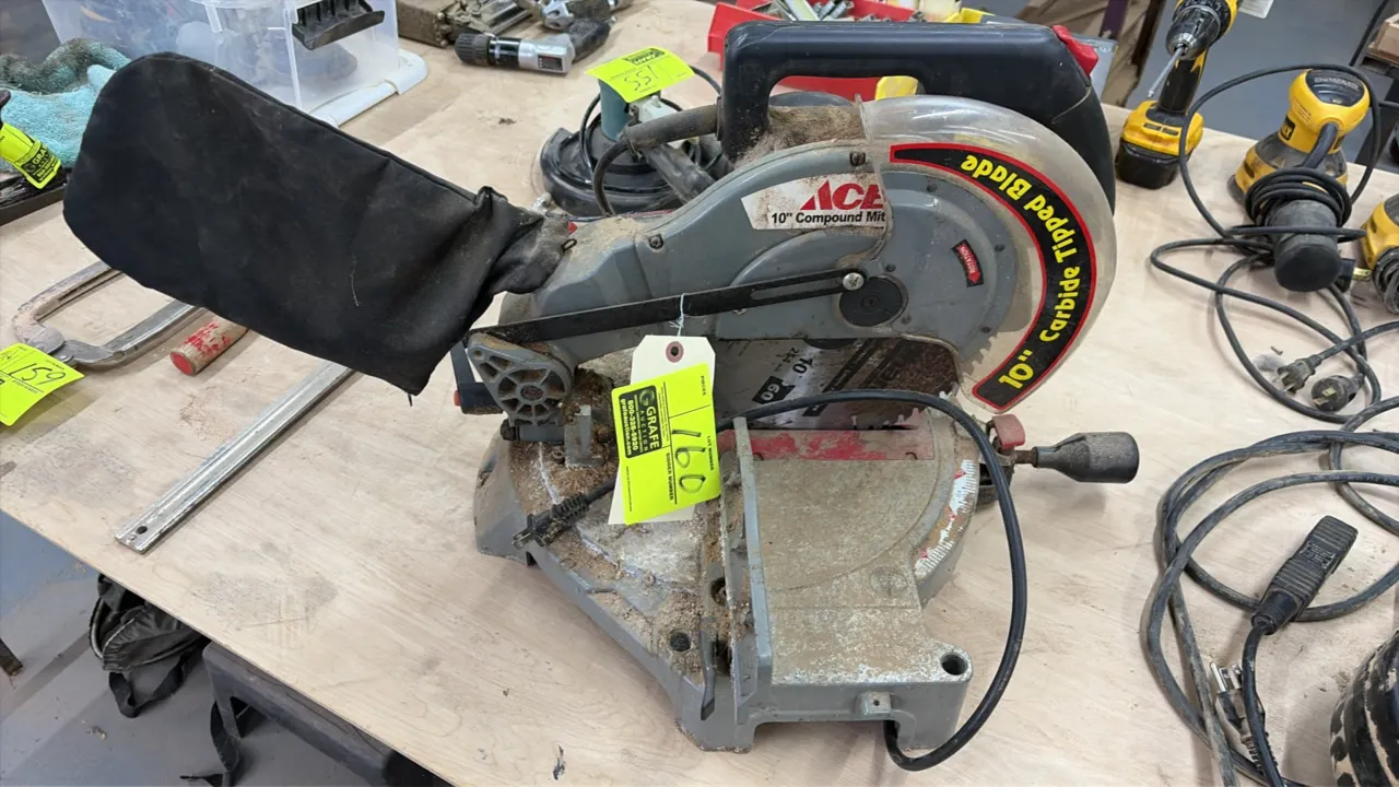 Ace 2124014 10" compound miter saw. Features a 10" carbide-tipped blade and dust collection bag. S/N: 07701169. Electrical: 120V, 60 Hz, 15A, 4800 RPM