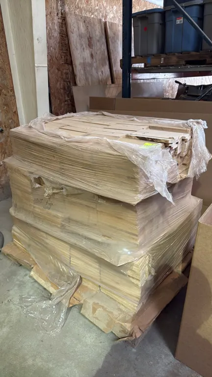 Pallet stack of maple lumber pieces. Individual pieces measure 10" x 3" x 1/2". Overall stack measures approx. 41" x 36" x 35"H. Palletized and stretc