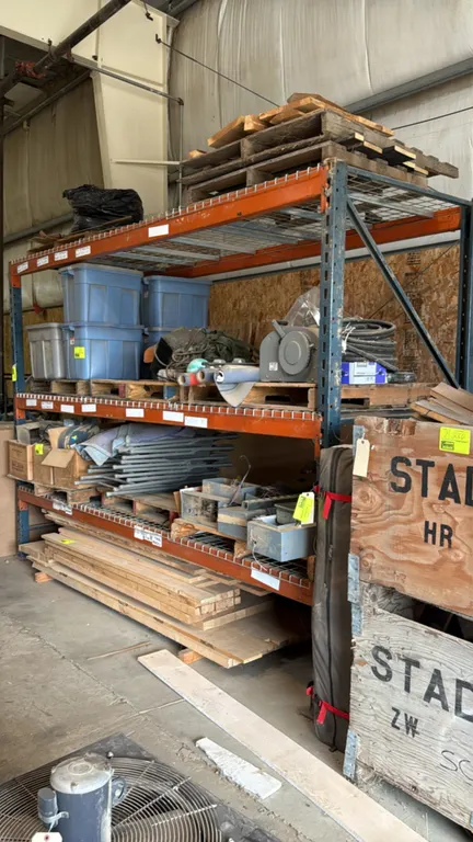 11'L pallet racking. Features blue upright frames, orange 4.5" cross beams, and wire mesh decking. Dimensions: 11' x 3'8" x 8'. Note: Beams appear wel
