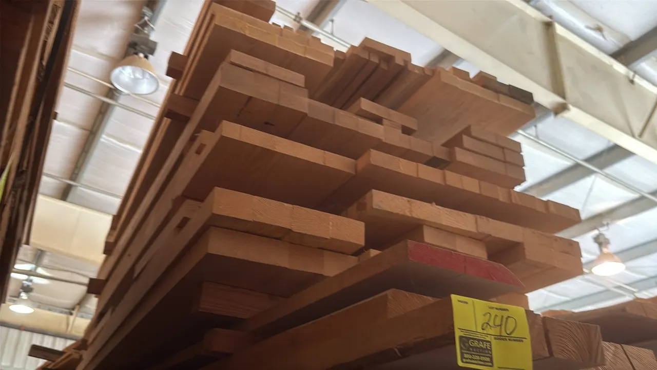 Skid of assorted wood boards and glued panels. Features varying board widths and edge-glued panels with 1.25" to 1.5" thickness. Stack dimensions: app