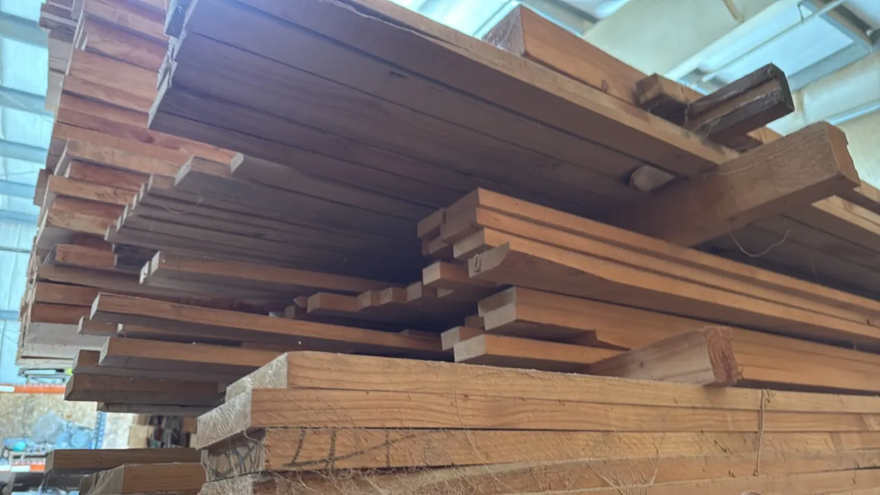 Skid lot of assorted wood boards. Features assorted wood species, board lengths, and thicknesses. Dimensions: Approx. 9' x 3' x 2'H.