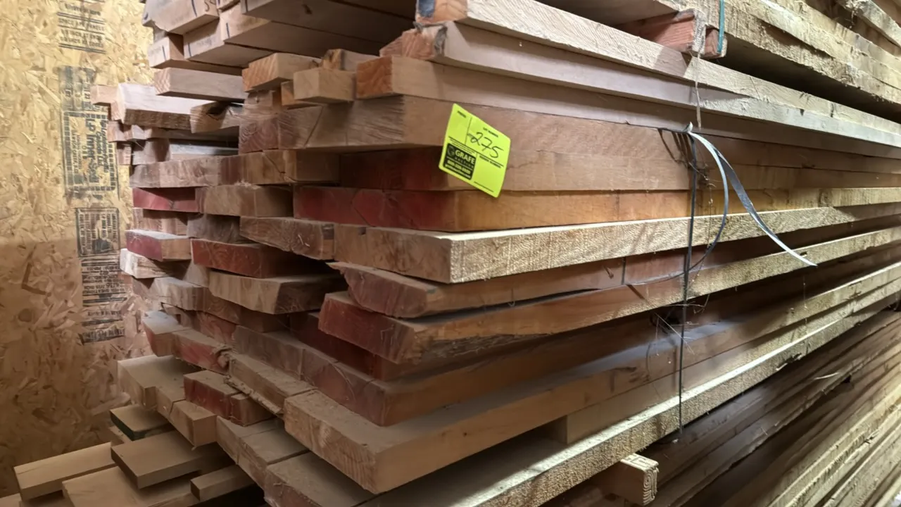 Pallet lot of assorted wood boards. Features rough-cut lumber in assorted lengths, widths, and thicknesses. Approximately 9'L x 3'4"W x 2'2"H overall.
