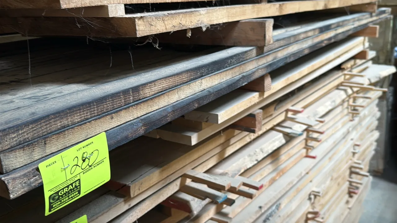 Skid of assorted wood boards. Features 1" thick boards. Stack measures approximately 10' x 3' x 2"H.