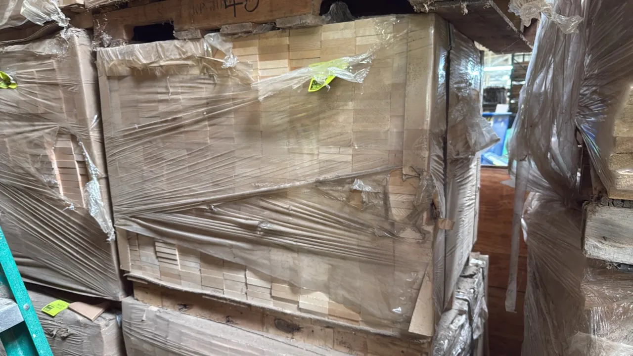 Pallet of cut maple stock. Features 0.75" thick lumber stock, stacked and wrapped on a wooden skid. Dimensions: 42" x 35" x 30".