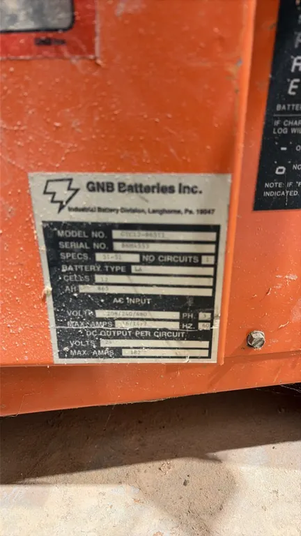 GNB GRC12-865T1 Ferrocharger industrial battery charger. S/N: 84H4533. Features 24V DC output at 182 max amps, 12 cells, and 865 Ah rating. Electrical