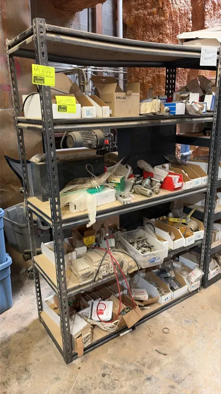 Metal 5-tier shelving rack. Features steel frame and composite decking. 48"L x 18"W x 72"H. Contents not included.