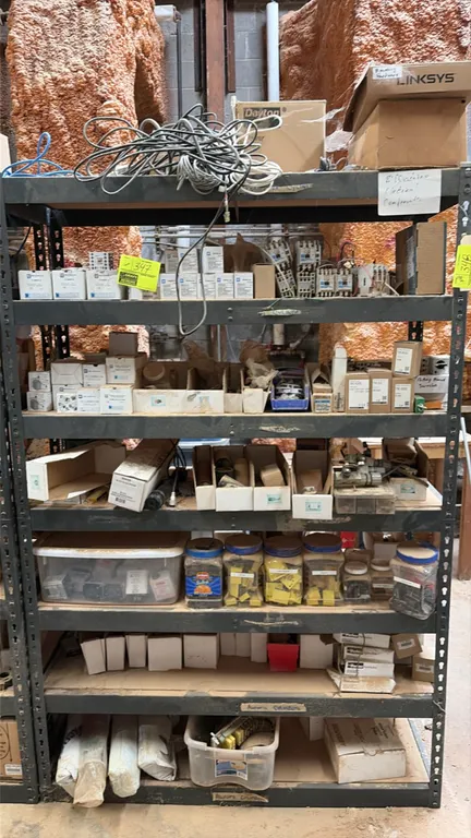 Metal 7-tier storage rack. 48"W x 18"D x 72"H. Contents not included.