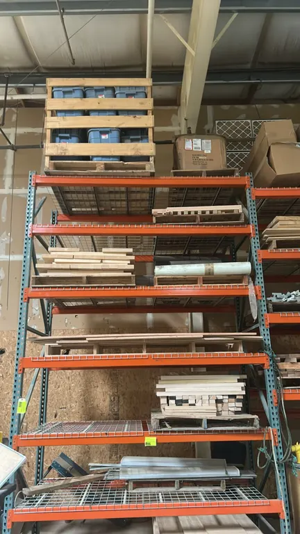 Pallets of assorted hardwood lumber, poly storage totes, and miscellaneous inventory. Includes stacked lumber boards, cutoffs, crated plastic storage