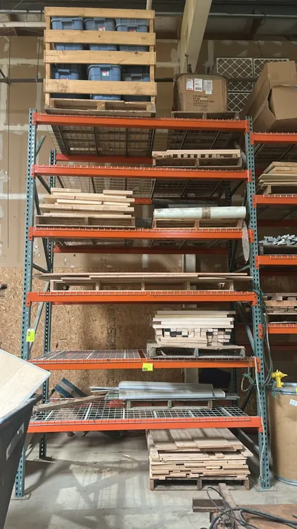 Metal teardrop pallet racking. Features 4" crossbars, wire mesh decking, green uprights, and orange step beams. Dimensions: 8'W x 3'8"D x 13'H per sec