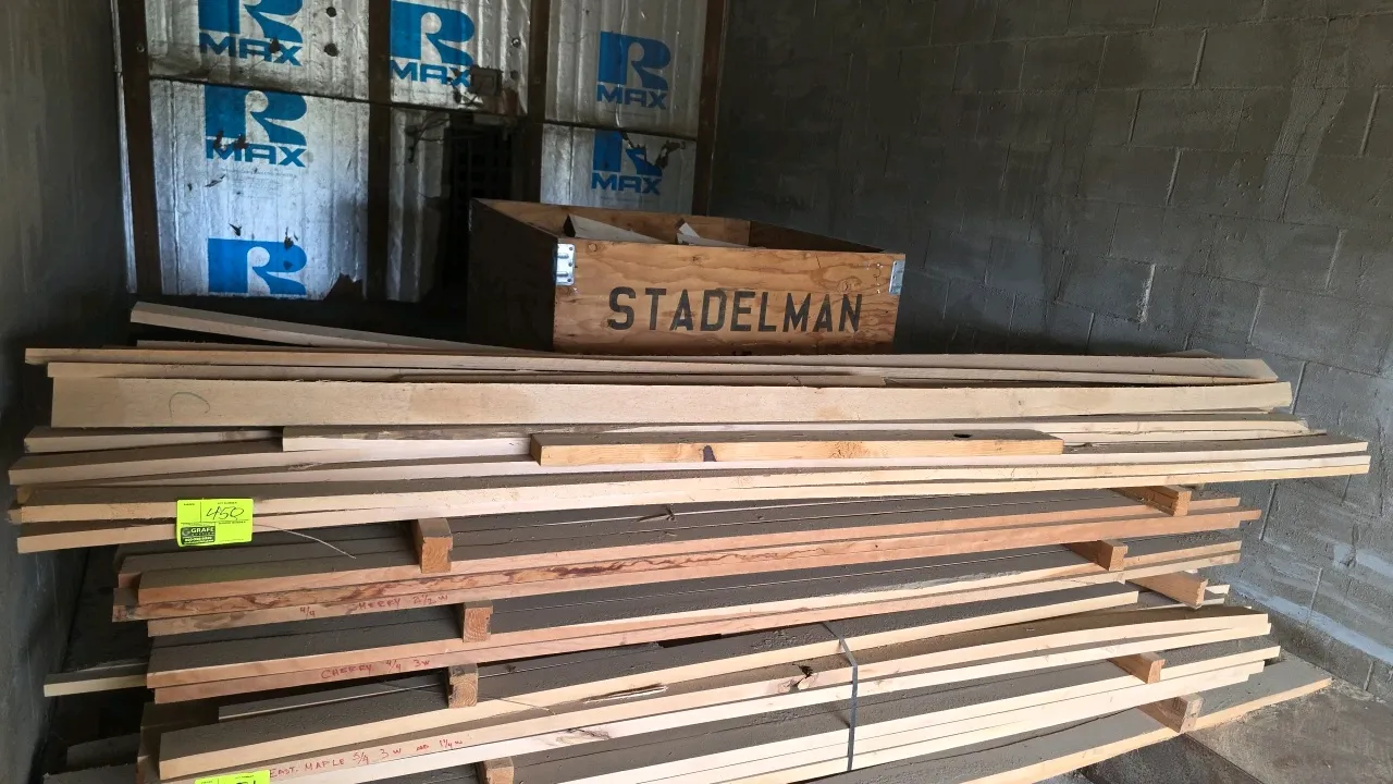 Assorted hardwood lumber stack. Includes approximately 10'L assorted hardwood and 8'5"L x 1"T cherry wood boards. Features marked cherry and eastern m