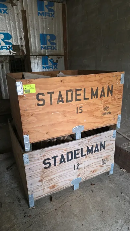 Wood bulk storage crates. Includes assorted length wood cuts. Plywood construction with metal corner reinforcements. 4'L.