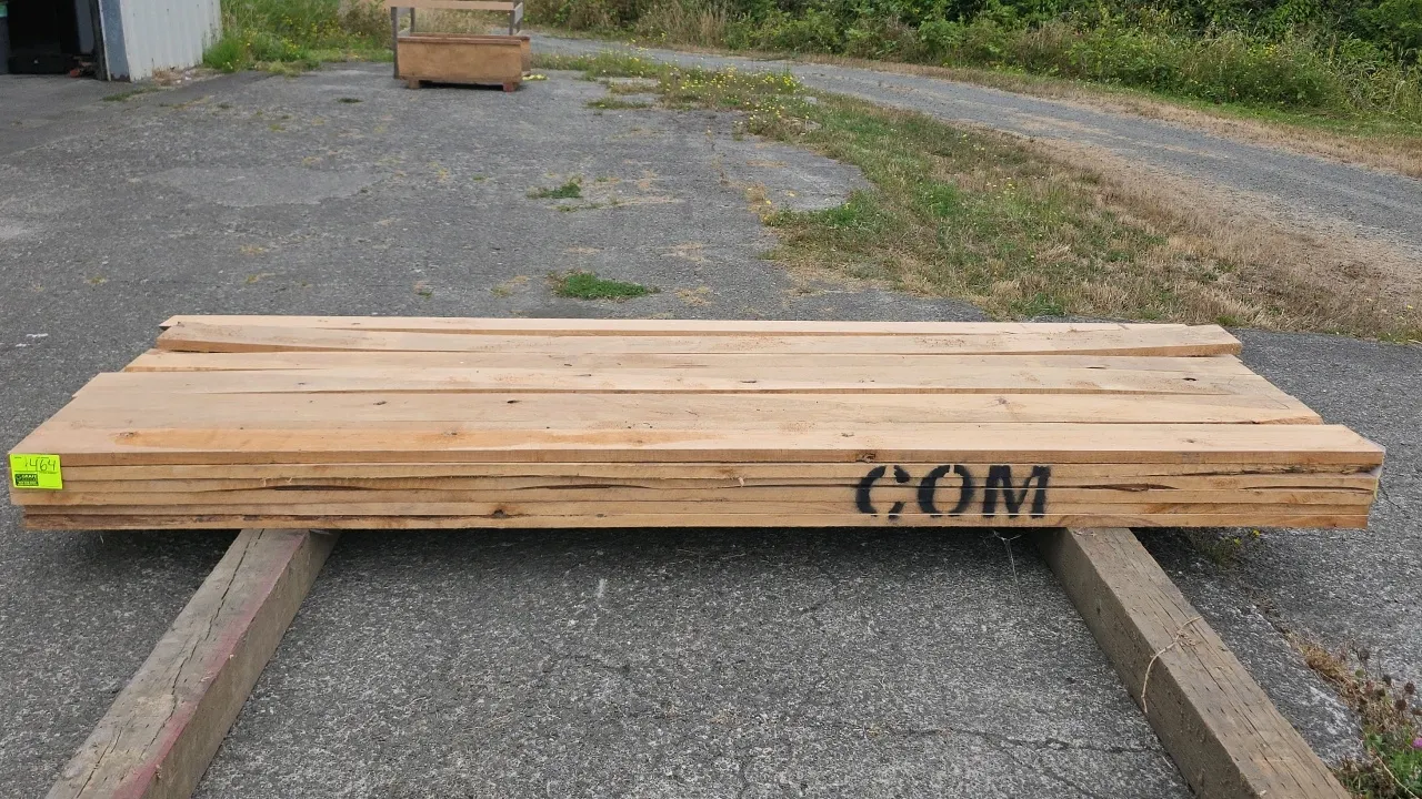 Stack of Pacific Northwest Alder hardwood lumber. Tag indicates Common grade, 5/4" thickness, 10' length, and 284 board feet. Tag # G 26191 dated 2-28