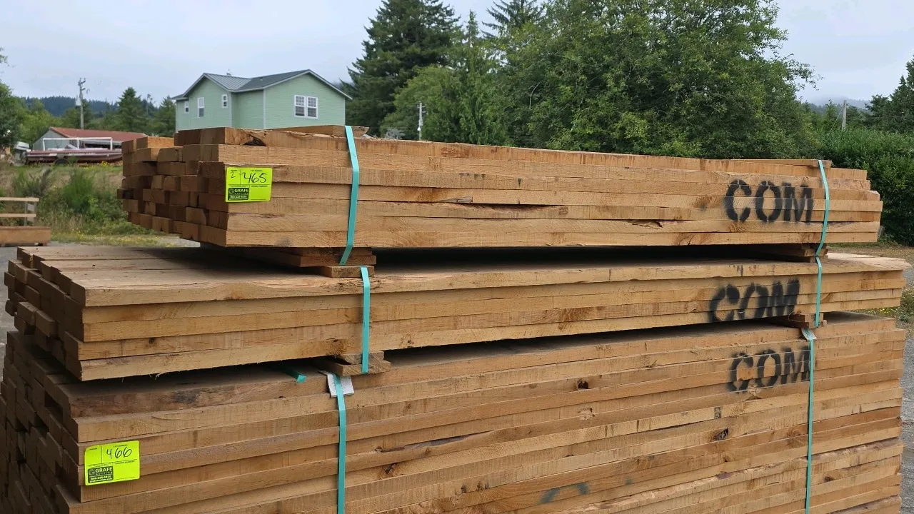 Bundles of Pacific Northwest Alder lumber. Grade: Common. Features 6/4 thickness (1-1/2" thick) in 8' and 10' lengths. Includes tagged bundles G24504