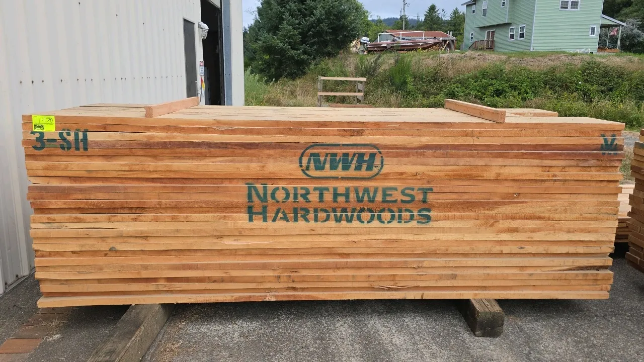 Northwest Hardwoods maple hardwood lumber stack. Features 6/4 (1-1/2" thick) 3Shop grade kiln-dried lumber. Tag indicates 1,372 BF. Approximately 10'L