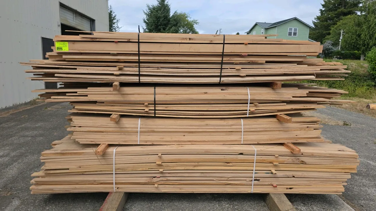 Bundles of alder hardwood lumber. Features banded bundles of assorted board widths. Dimensions: Approx. 8' to 10'L x 1/2" to 1" thick.