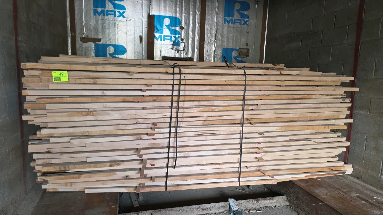 Bundle of alder hardwood lumber. Strapped and stickered bundle. Approx. 8' to 10'L x 1" to 1.5" thick.