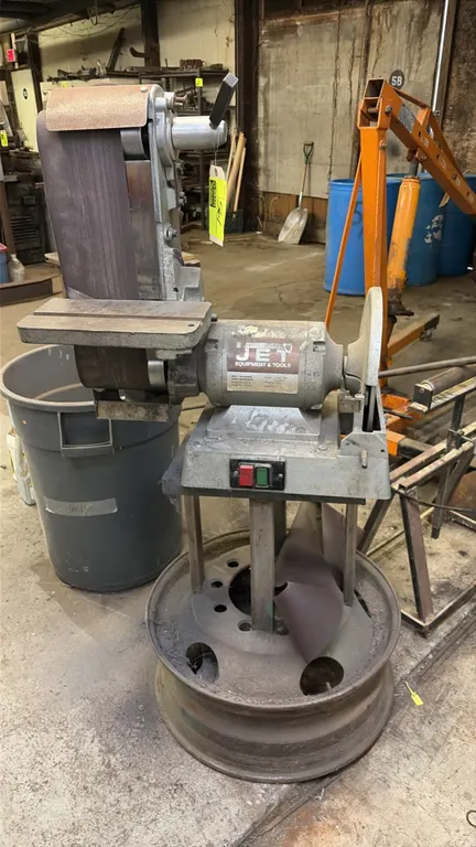 Jet JSG-6 belt sander and disc grinder combination machine. Features a vertical belt sanding assembly with slotted work table, disc sander with guard,