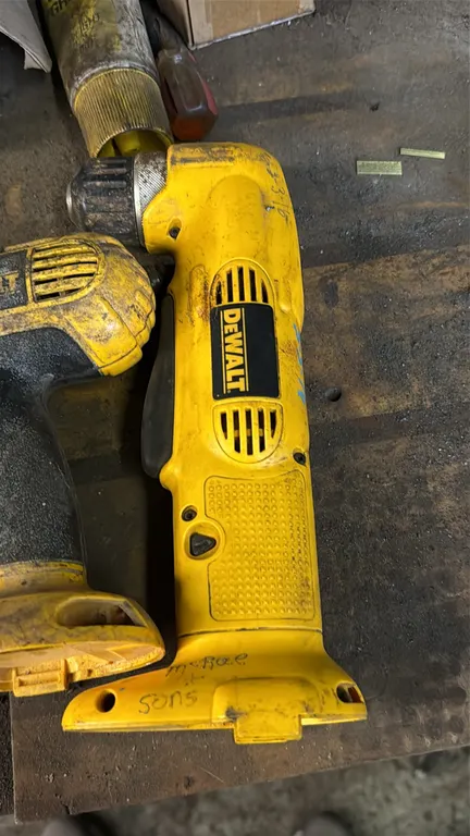 DeWalt 14.4V cordless tool set. Includes cordless drill/driver, right-angle drill, (1) battery, and DeWalt DW9118 battery charger. Electrical: 120V (c