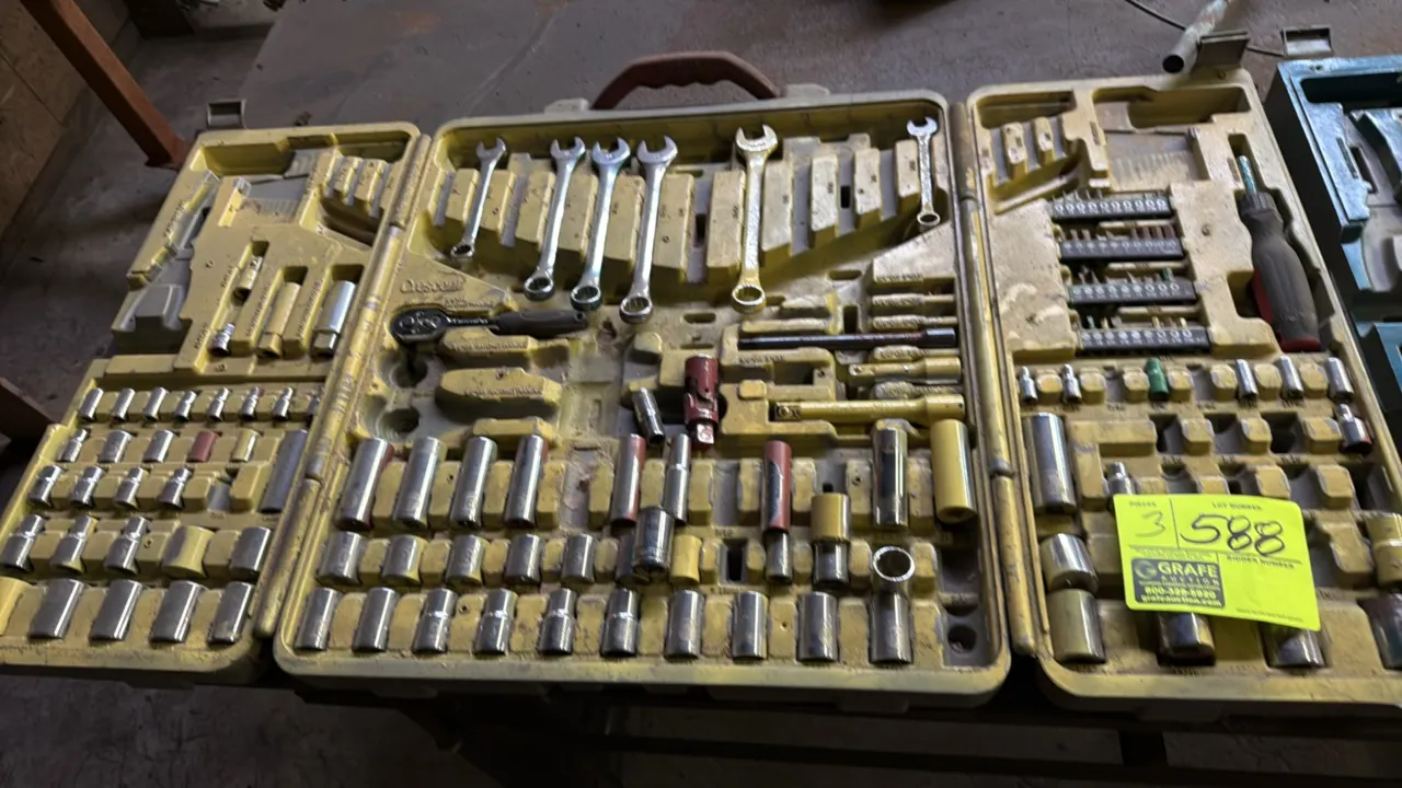 Crescent mechanic's tool and socket sets. Features assorted SAE and metric sockets, wrenches, ratchets, and driver bits housed in folding blow-molded