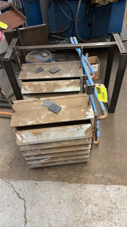 Hanging gas unit heaters. Features front directional louvers, hanging bracket mounts, and side piping connections. Note: Offered for parts only.