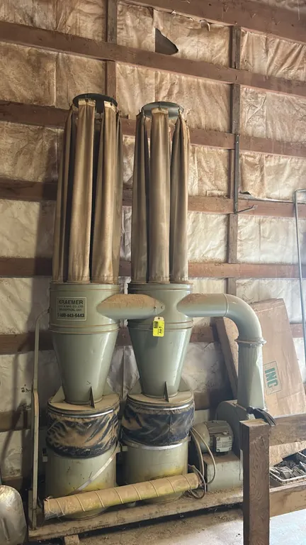Kraemer KTM S52-12 CYN dual-stage industrial dust collection system. Features dual cyclone separators, upper cloth filter tubes, lower collection drum