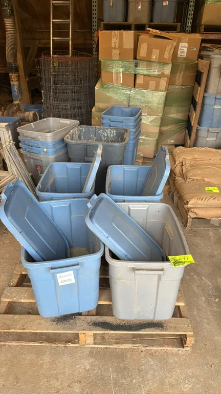 Poly storage totes lot. Includes (4) plastic storage totes containing sandblasting abrasive media along with an assortment of empty plastic storage to