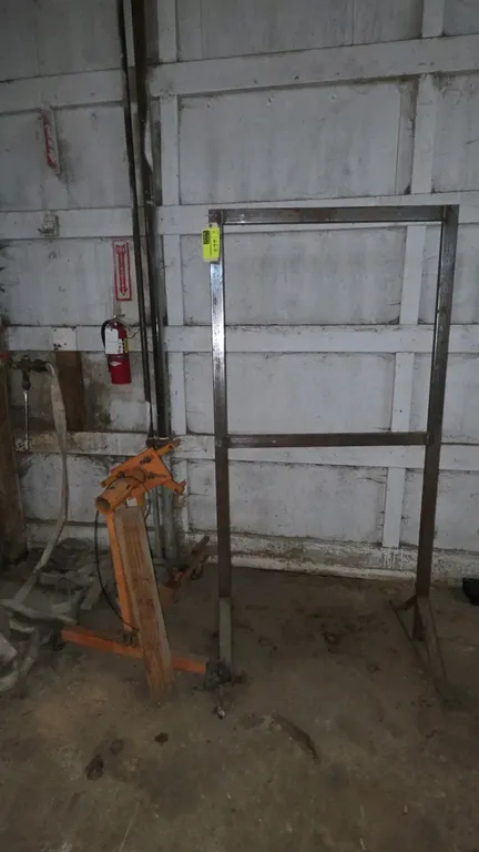 Allied ES7A 750 lb capacity engine stand and metal rack. Engine stand features adjustable mounting arms and base casters. Metal rack measures 36" x 73