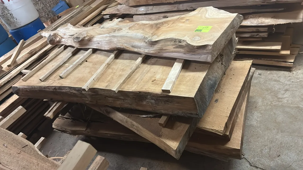 Live edge cedar boards. Rough sawn slab lumber stack. 75" x 37" x 39".