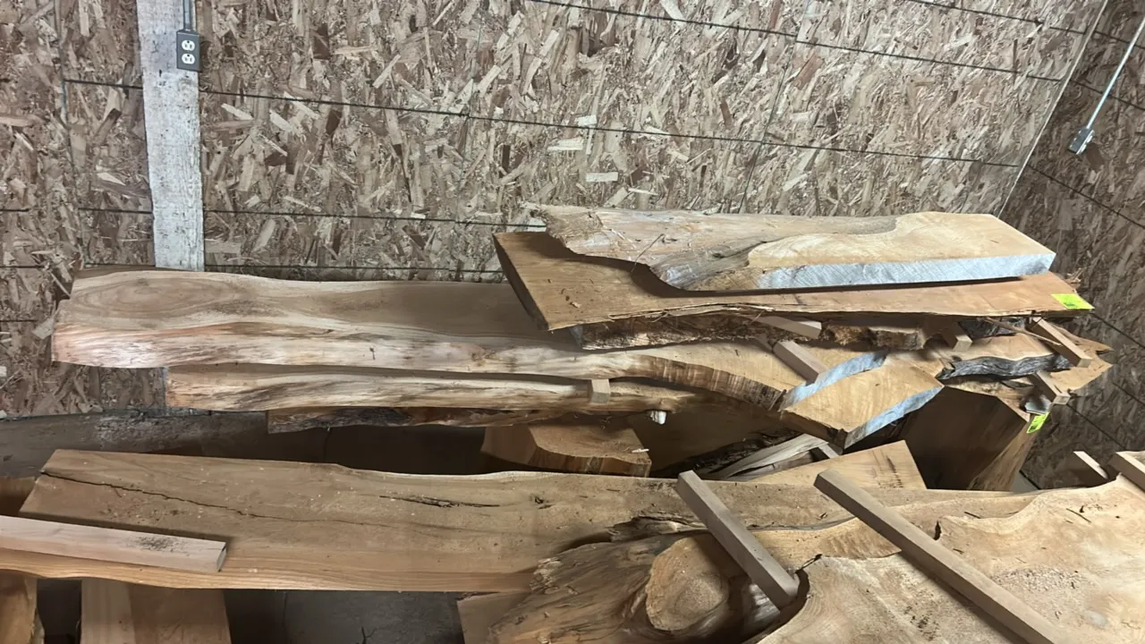 Live edge cedar boards. Stack of live edge wood slabs. 142" x 18" x 54".