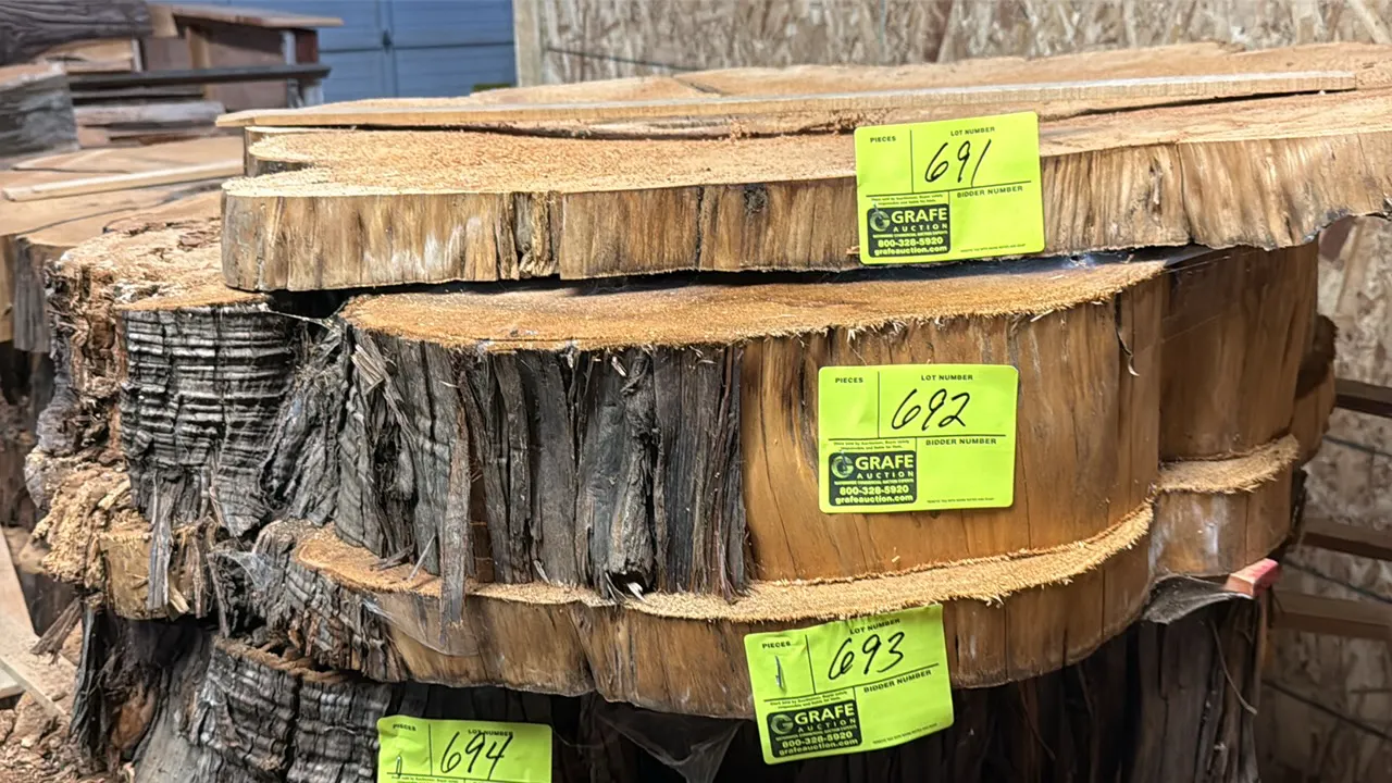 Cedar live edge cross-cut tree slab. Features natural bark edge. Approx. 45" dia. x 5.5" thick.