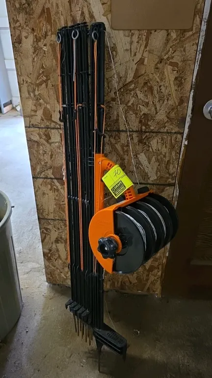 Gallagher G70000 SmartFence 2 portable electric fence system. Features integrated 4-wire reels, step-in posts, and carrying handle.