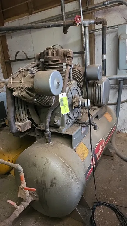 1993 Dayton 5Z634 2-stage horizontal air compressor. Features 25 HP Leroy Somer electric motor and horizontal air receiver tank. S/N: 051993L-972001.