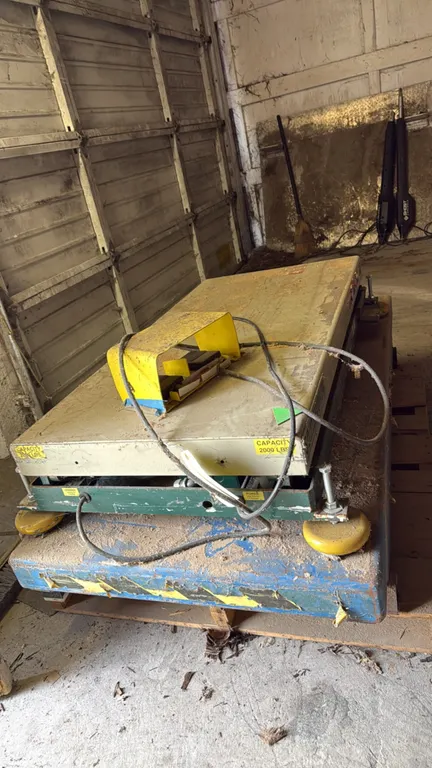 Southworth and T&S Equipment scissor lift tables. Includes (1) Southworth 2,000 lb capacity lift table with guarded foot pedal control and 115V, 1-Pha