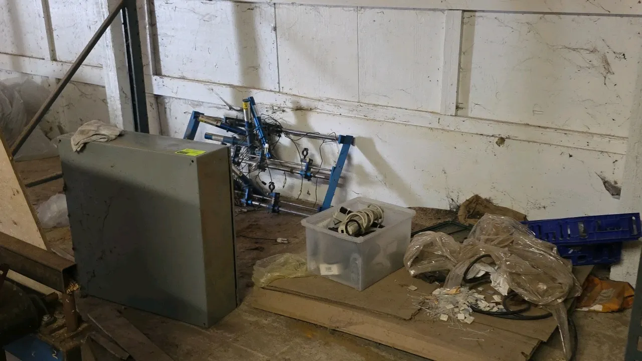 Assorted electrical items lot. Includes an industrial electrical control panel enclosure with push-button controls, relays, terminal blocks, and motor