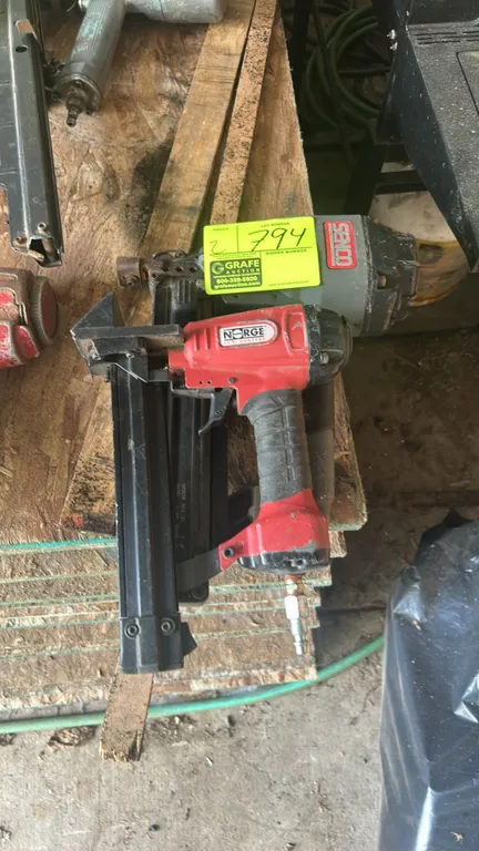 Senco and Norge pneumatic nail guns. Includes (1) Senco pneumatic nailer and (1) Norge pneumatic nailer. Features strip-feed magazines and quick-conne
