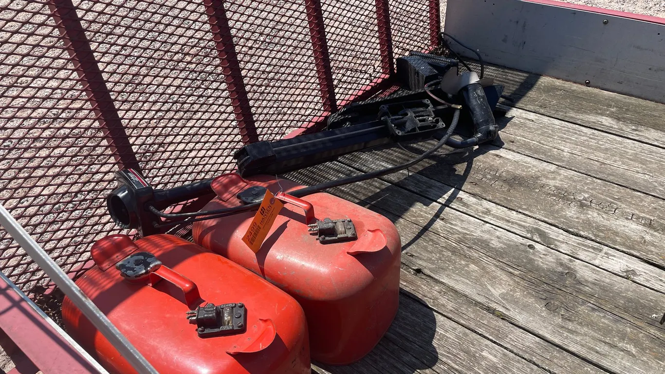 Johnson Trolling Motor and (2) Boat Fuel Cans