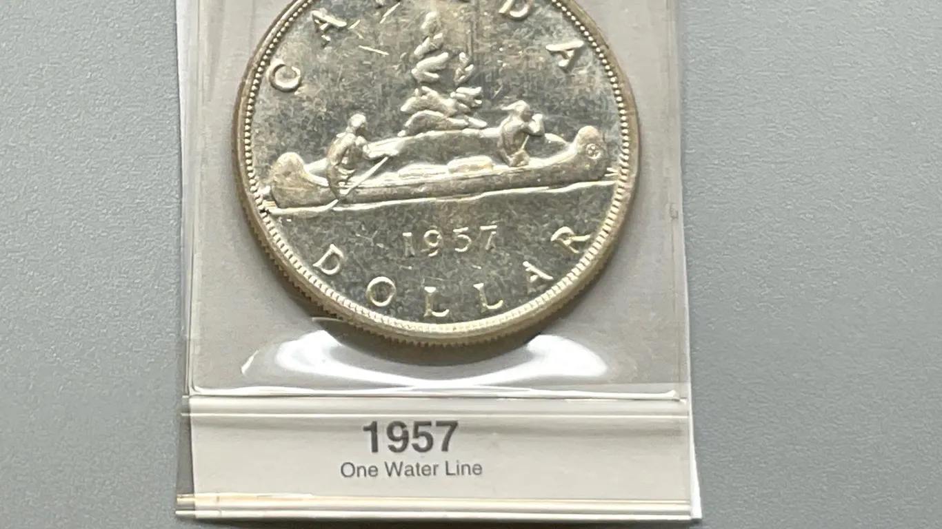 1957 Silver ‘One Water Line” Dollar