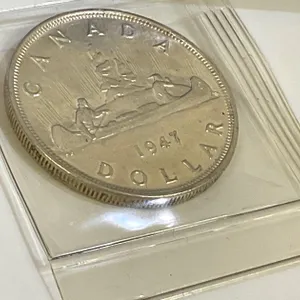 1947 (Quad HP Punch/Pointed 7) Silver Dollar