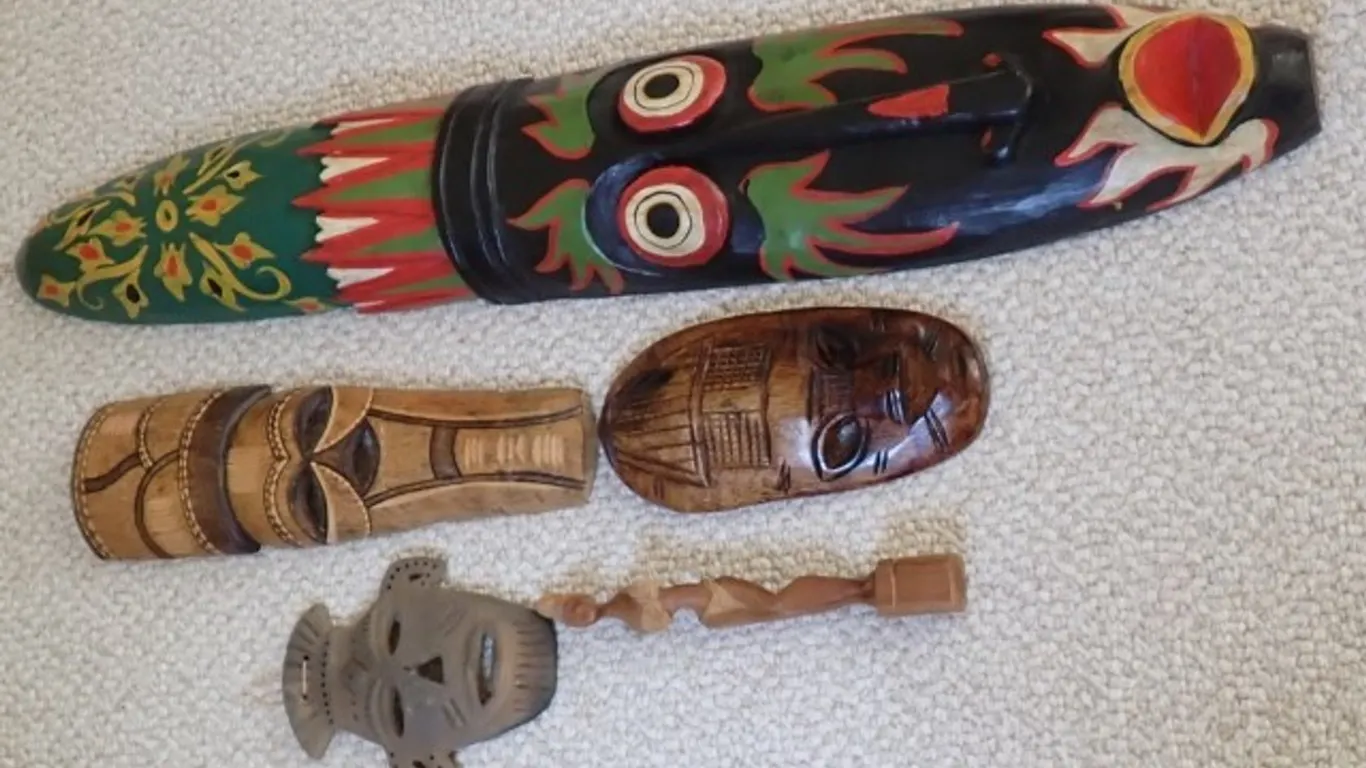 Collection of Hand-Carved Tribal Masks+