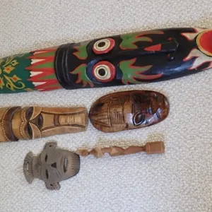 Collection of Hand-Carved Tribal Masks+
