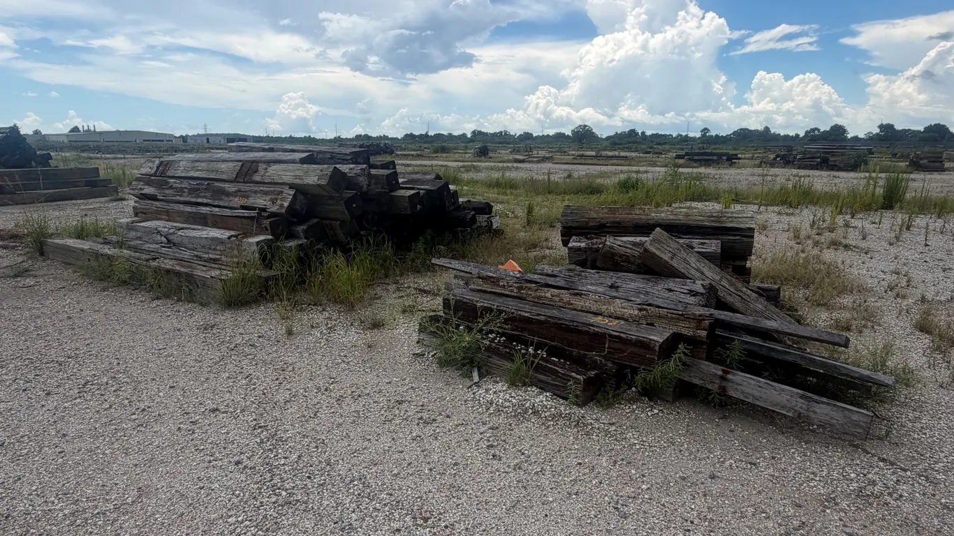 TWO PILES OF RAILROAD TIES