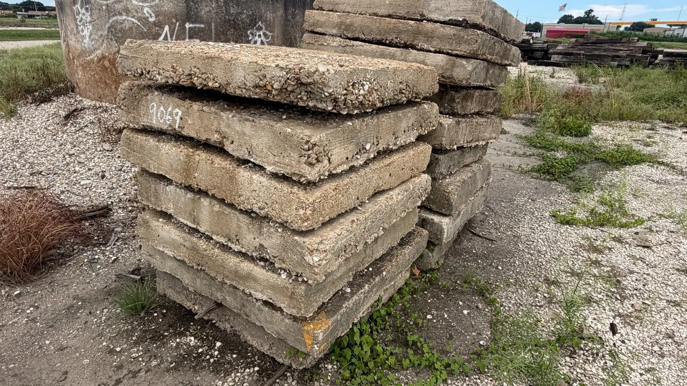 PILE OF CONCRETE PAVERS