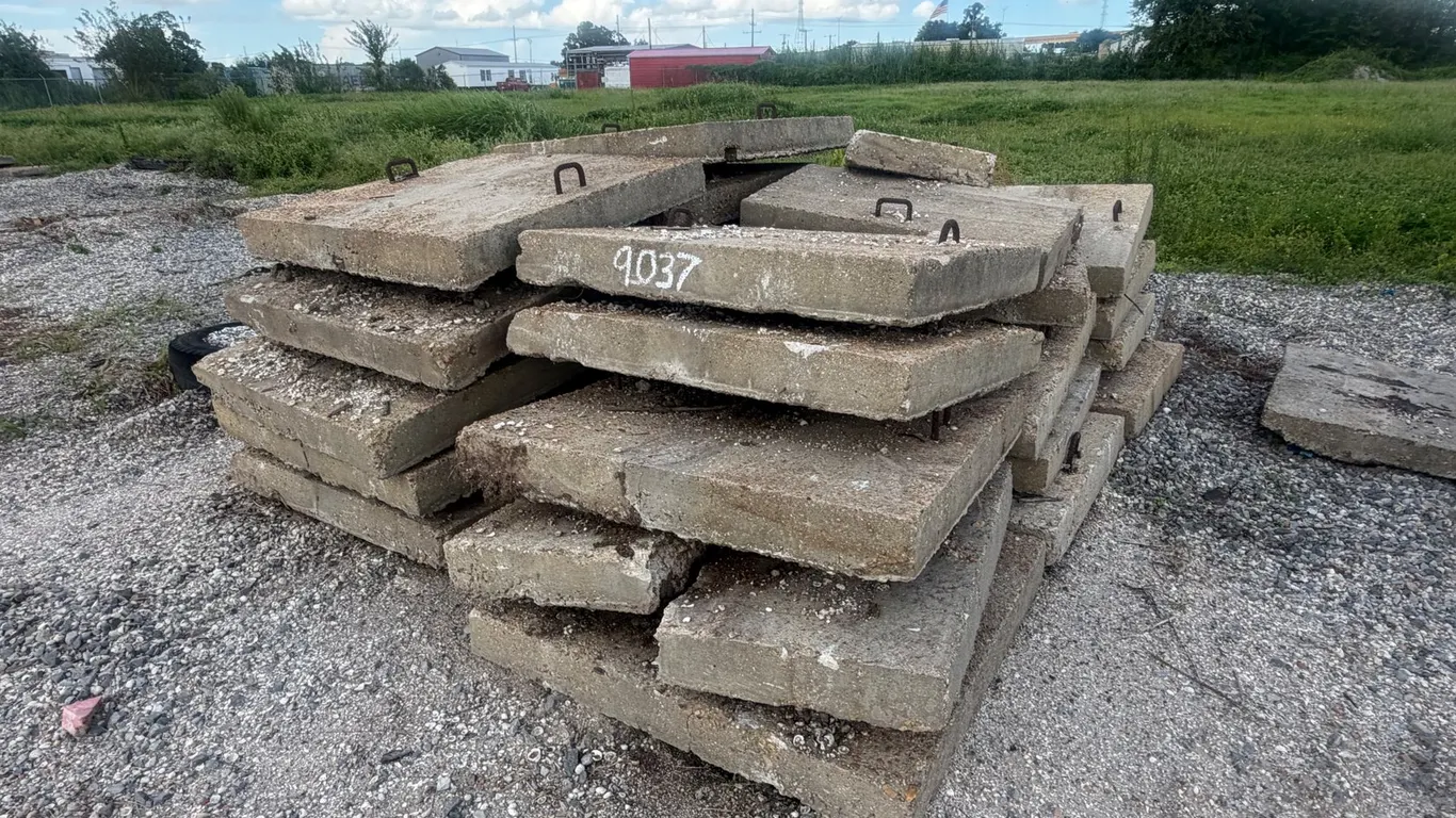 PILE OF CONCRETE PAVERS