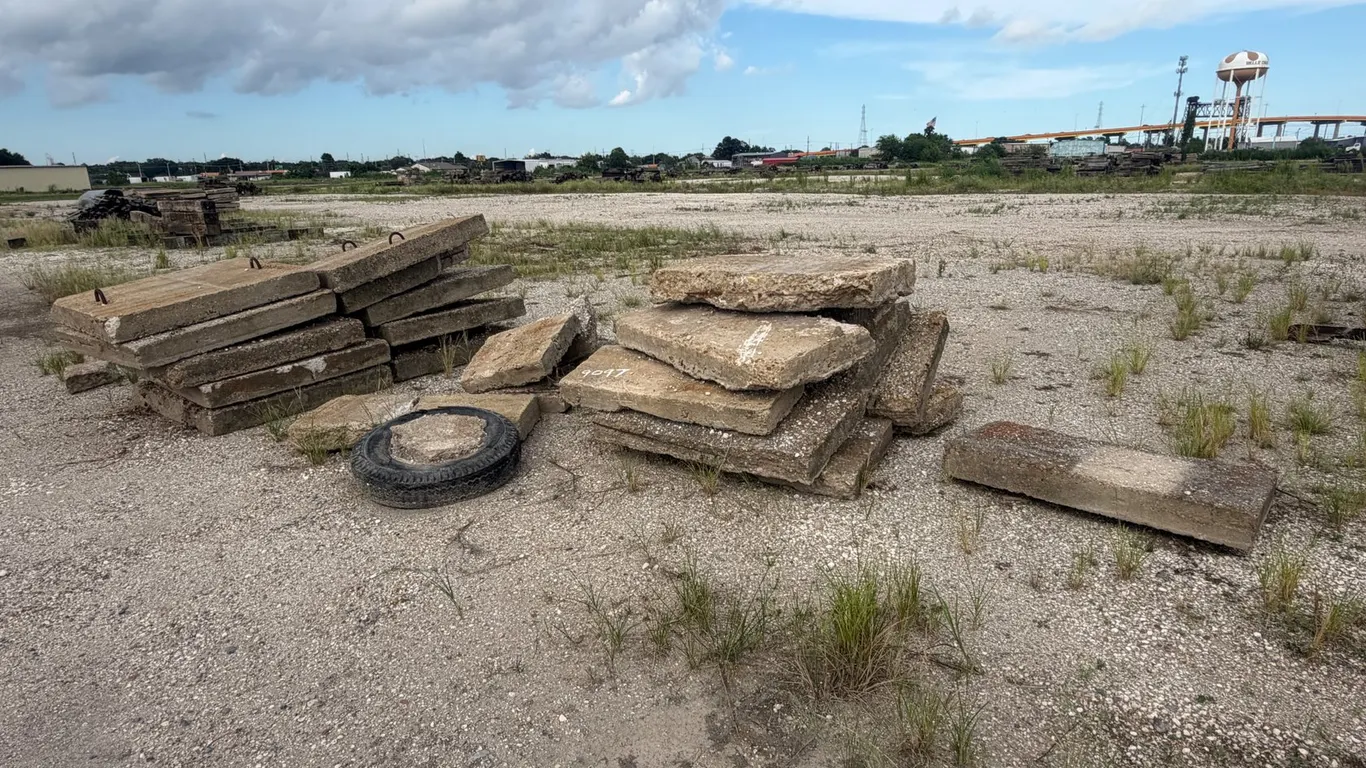 PILE OF CONCRETE PAVERS