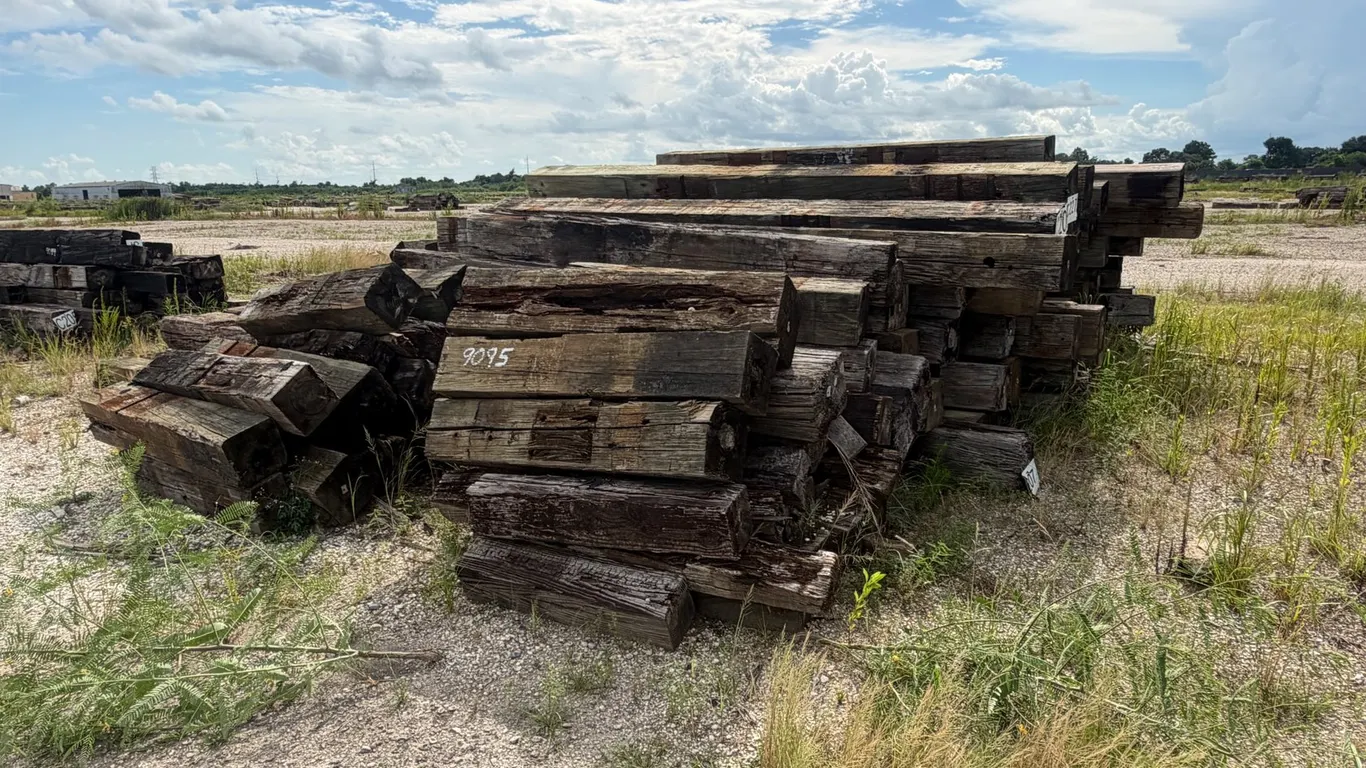 TWO PILES OF RAILROAD TIES