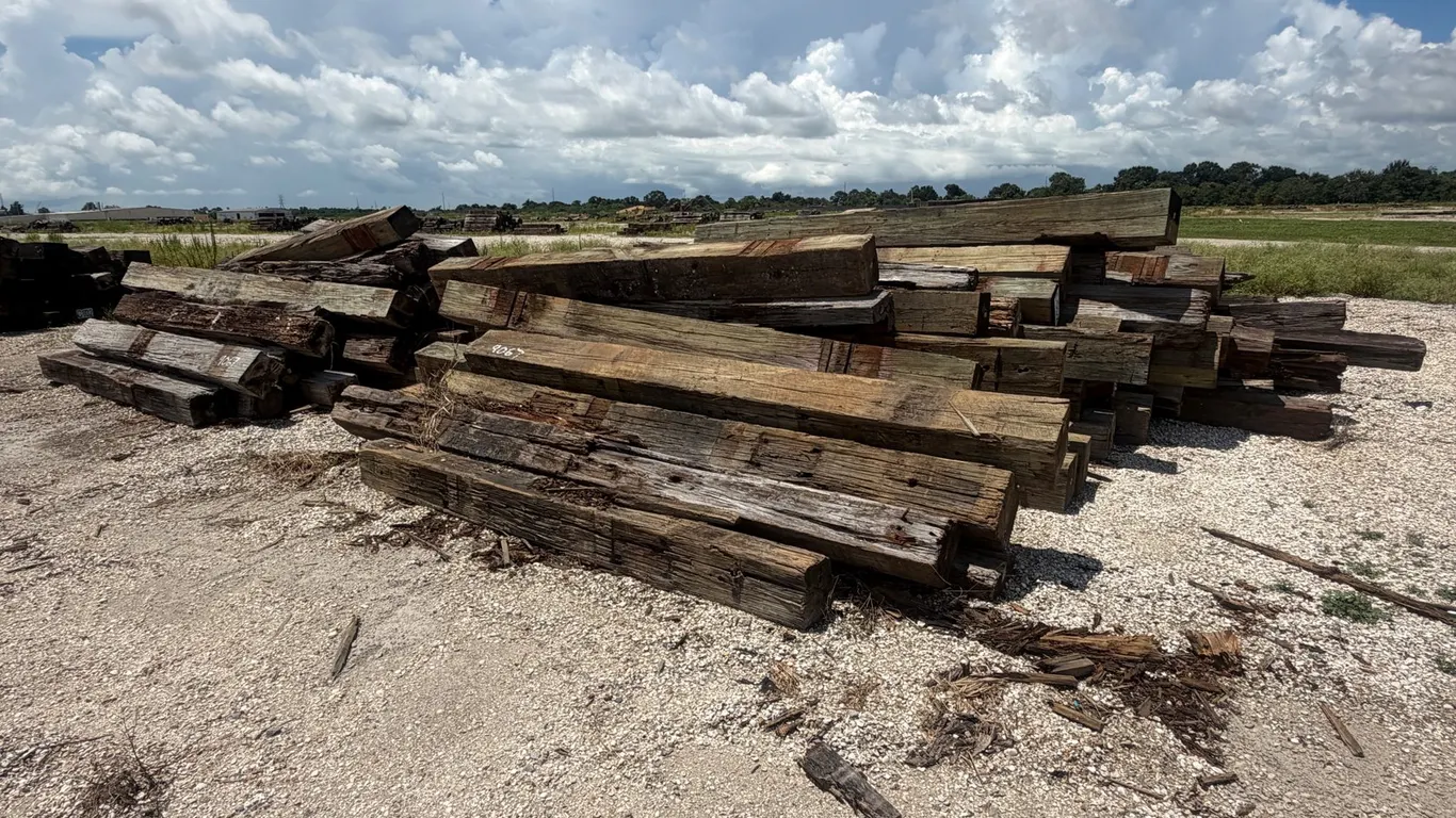TWO PILES OF RAILROAD TIES