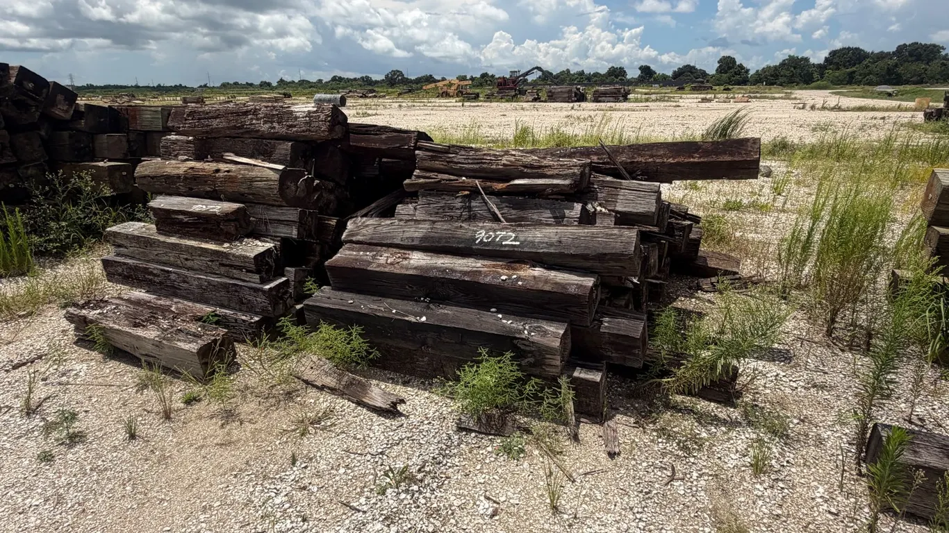 TWO PILES OF RAILROAD TIES