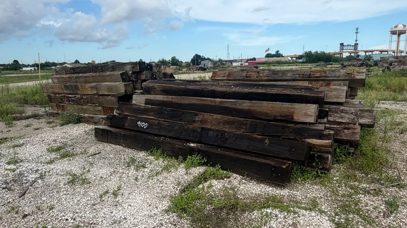 TWO PILES OF RAILROAD TIES