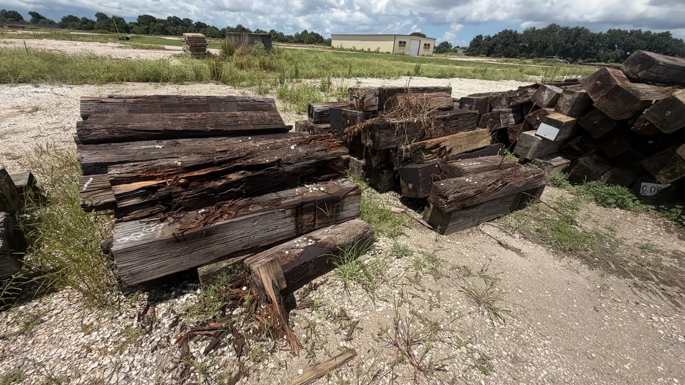 TWO PILES OF RAILROAD TIES
